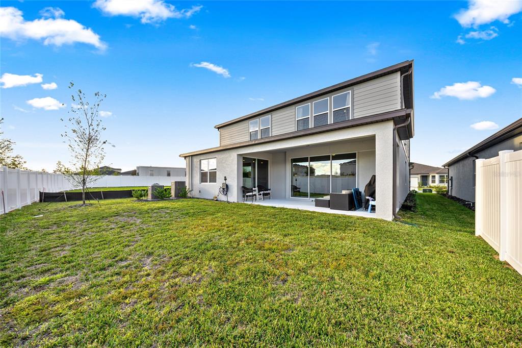 4472 Southwest 84th St Road Ocala, FL 34476 - Photo 43 of 50 a view of a house with backyard and porch
