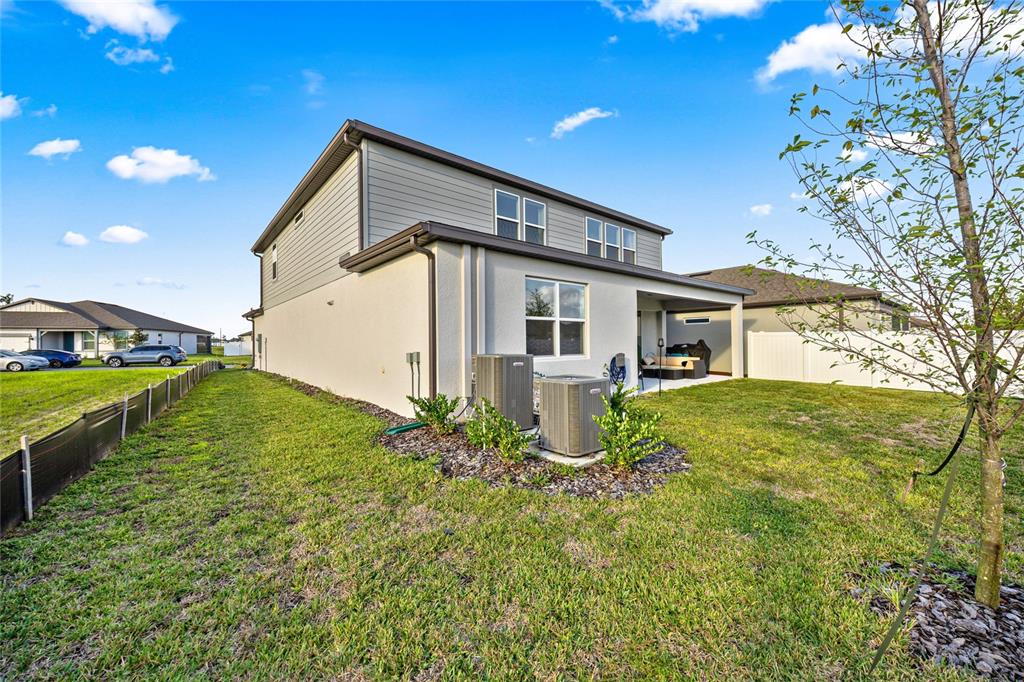 4472 Southwest 84th St Road Ocala, FL 34476 - Photo 44 of 50 a view of a house with a yard