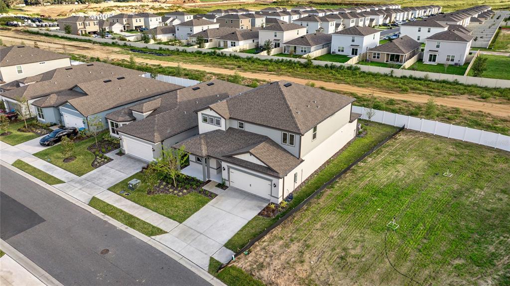 4472 Southwest 84th St Road Ocala, FL 34476 - Photo 46 of 50 an aerial view of residential houses with yard and ocean view