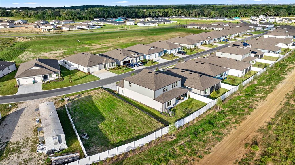 4472 Southwest 84th St Road Ocala, FL 34476 - Photo 50 of 50 an aerial view of residential houses with outdoor space and river