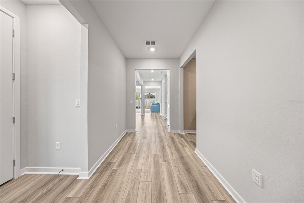 4472 Southwest 84th St Road Ocala, FL 34476 - Photo 6 of 50 a view of a room with wooden floor