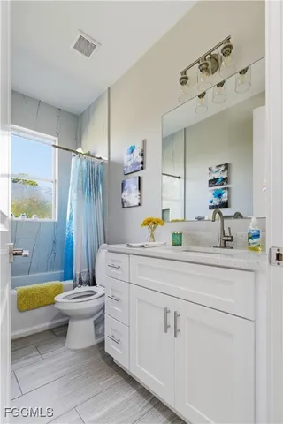 an outdoor space with wooden floor