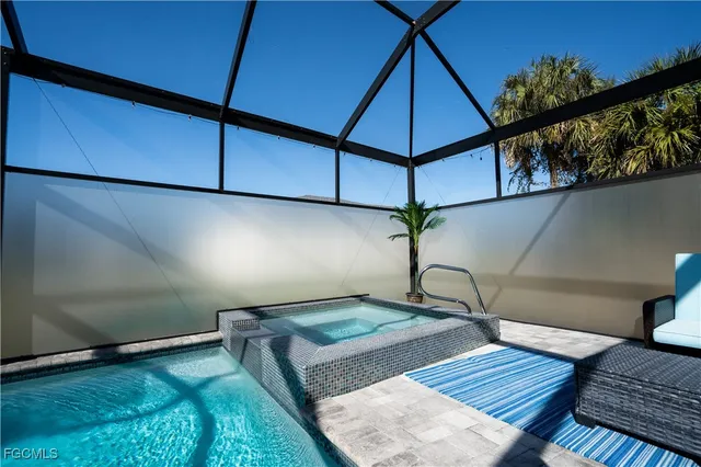 a view of an chairs and table in the patio