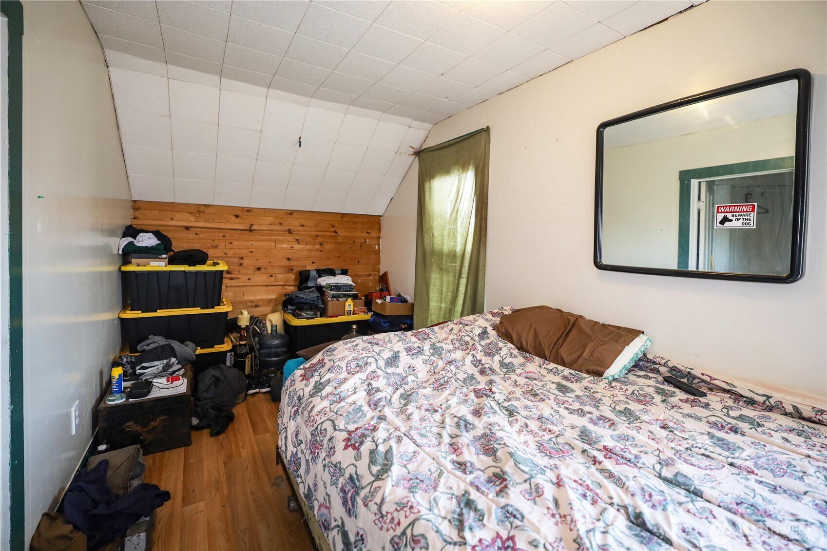 811 West Market Street Aberdeen, WA 98520 - Photo 18 of 35 a bedroom with bed and a mirror