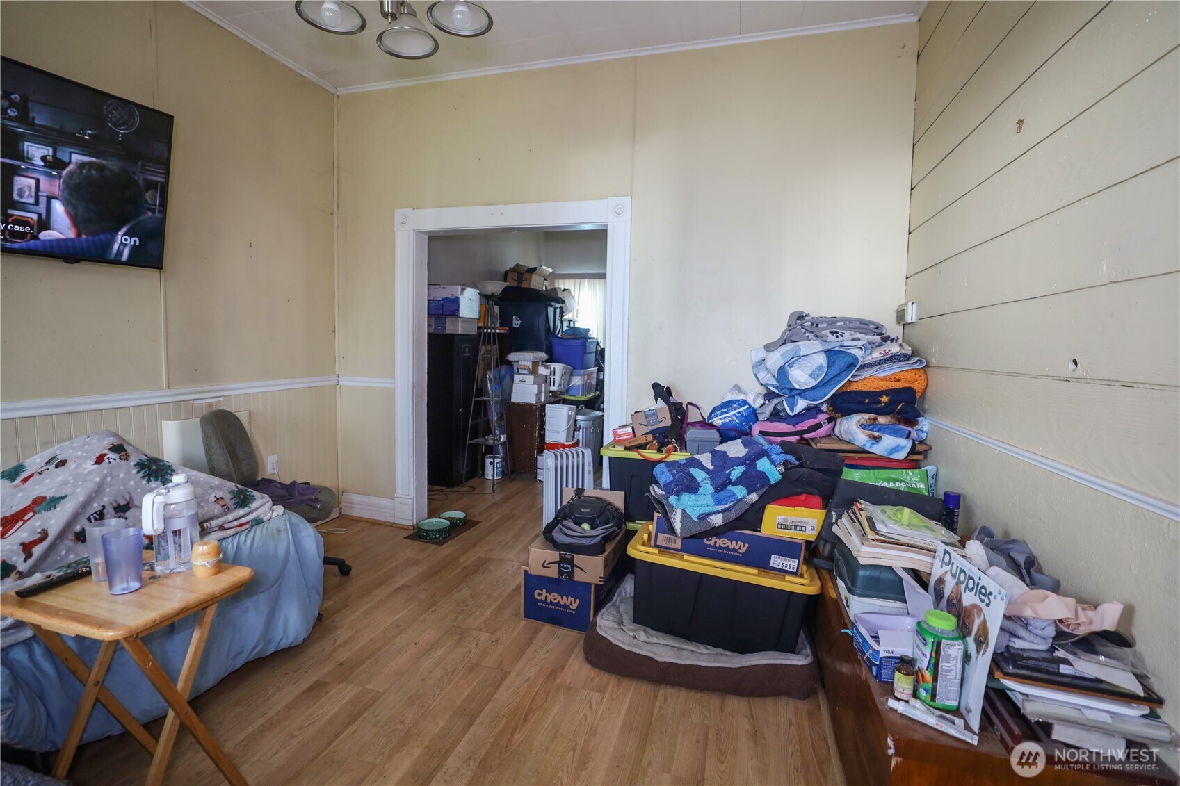 811 West Market Street Aberdeen, WA 98520 - Photo 25 of 35 a bedroom with furniture and wooden floor