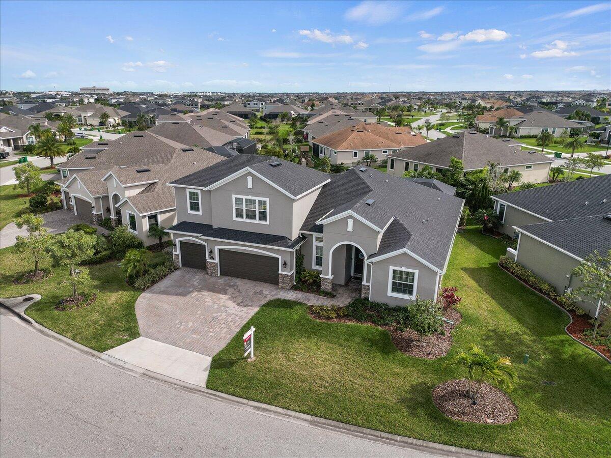 3447 Caviston Way Melbourne, FL 32940 - Photo 36 of 57 an aerial view of a house with a yard