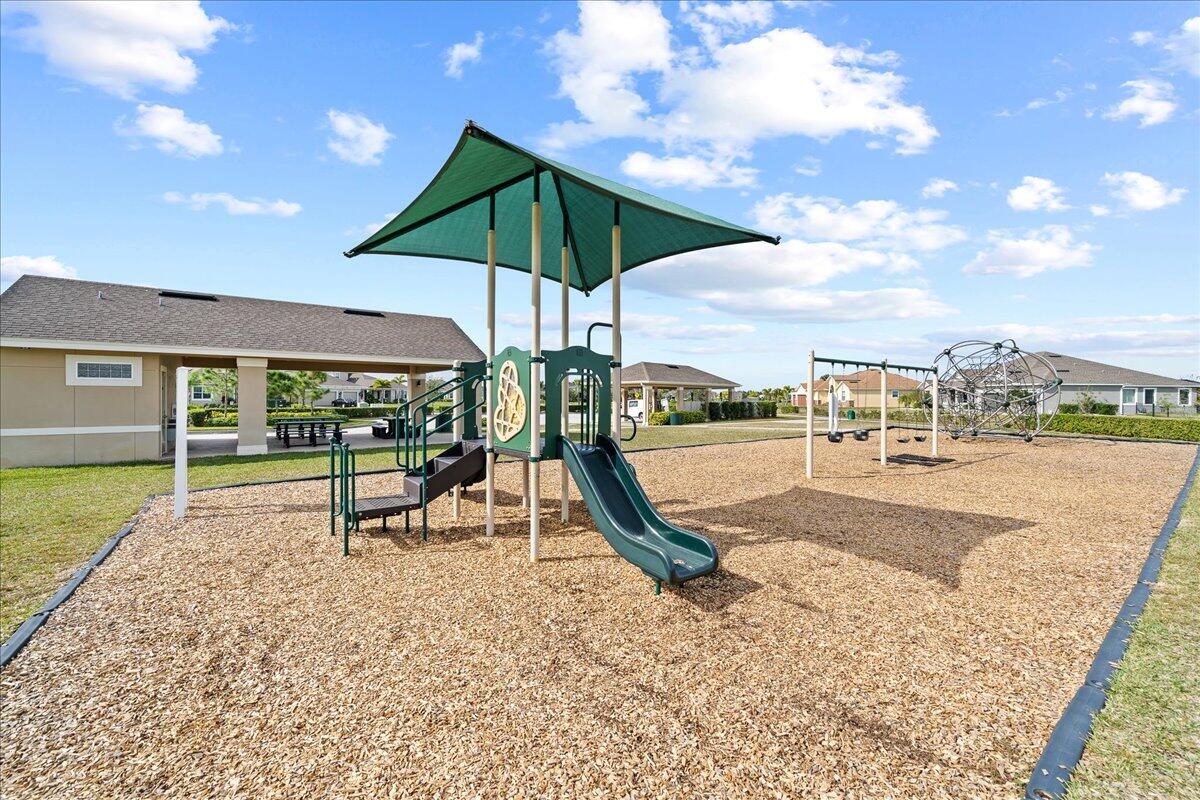 3447 Caviston Way Melbourne, FL 32940 - Photo 45 of 57 a view of a park with slide