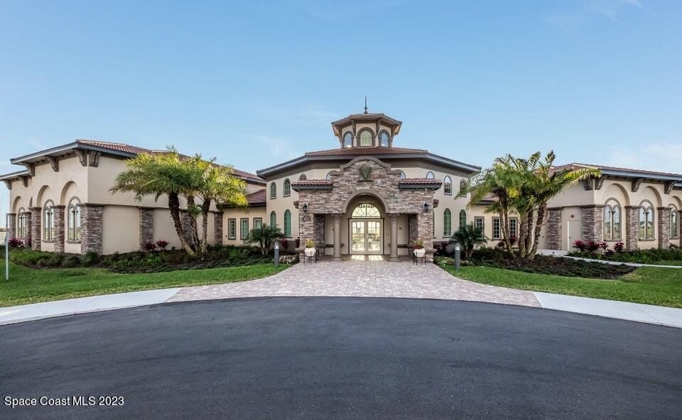 3447 Caviston Way Melbourne, FL 32940 - Photo 46 of 57 a view of a building with a yard