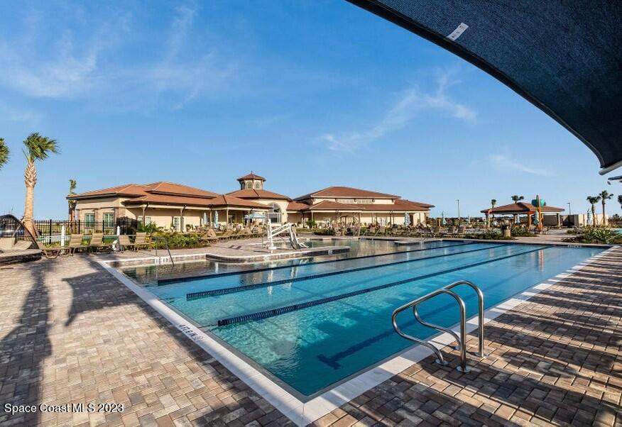 3447 Caviston Way Melbourne, FL 32940 - Photo 49 of 57 a view of a balcony with chairs