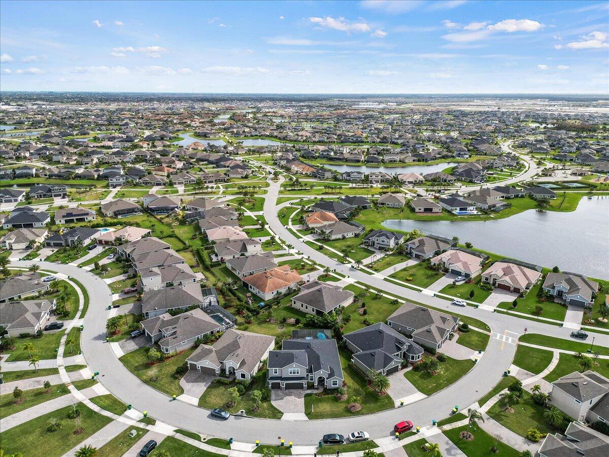 3447 Caviston Way Melbourne, FL 32940 - Photo 53 of 57 an aerial view of residential houses with outdoor space