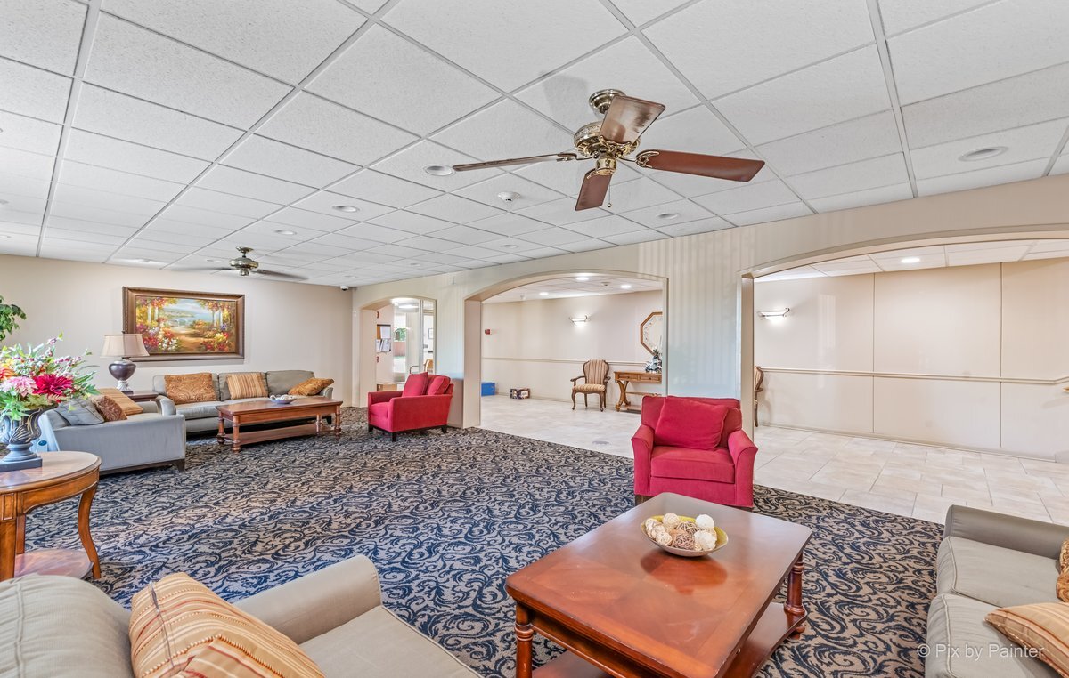 1311 South Finley Road, Unit 104 Lombard, IL 60148 - Photo 13 of 15 a living room with furniture