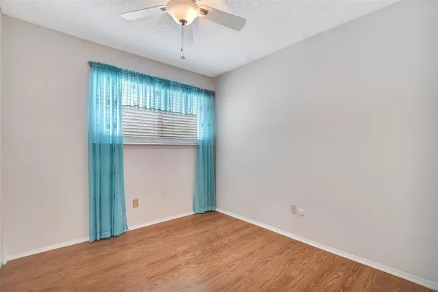 a picture of a room with a white wall and white walls