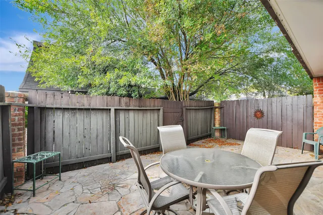 a view of a livingroom with furniture and hardwood floor