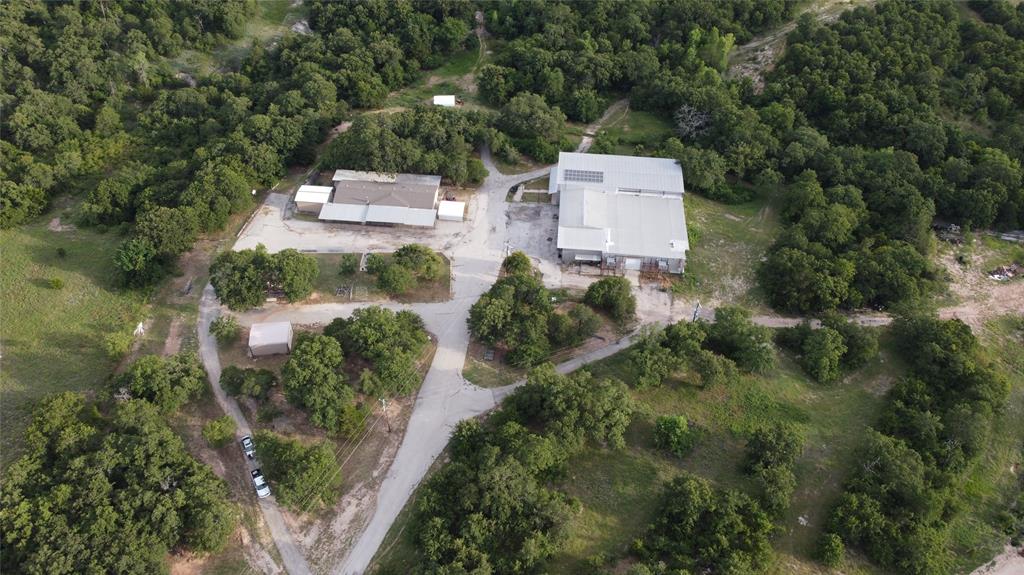 an aerial view of a house with outdoor space and street view