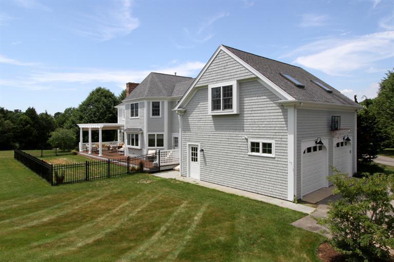 29 Farm Valley Road Osterville, MA 02655 - Photo 3 of 24 a front view of house with yard and seating area