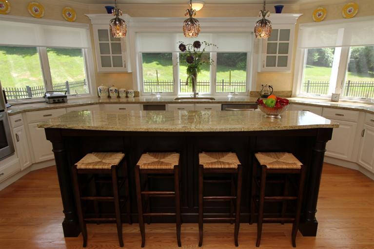 29 Farm Valley Road Osterville, MA 02655 - Photo 6 of 24 a kitchen with a sink and chairs
