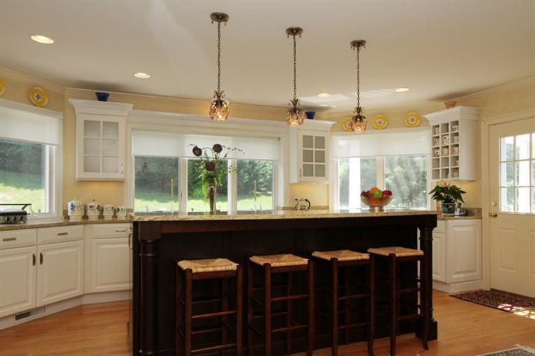29 Farm Valley Road Osterville, MA 02655 - Photo 7 of 24 a kitchen with a table and chairs in it