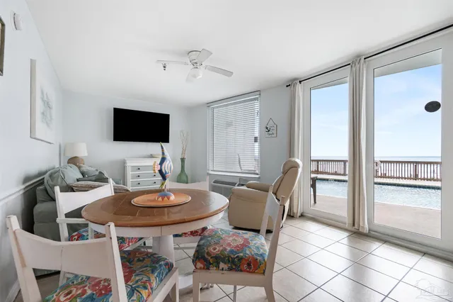 a view of a dining room with furniture