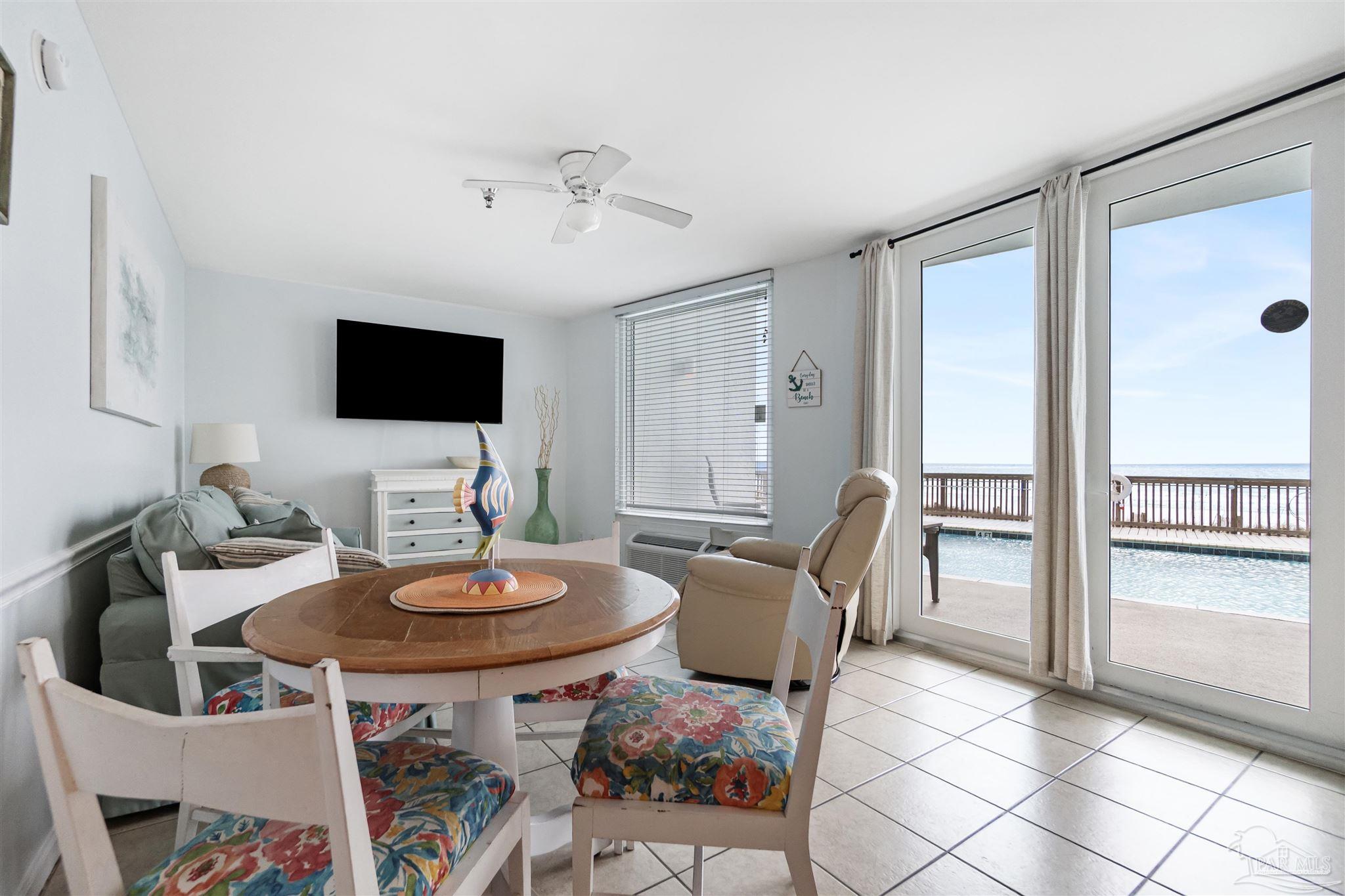 13785 Perdido Key Drive, Unit G3 Perdido Key, FL 32507 - Photo 12 of 30 a view of a dining room with furniture