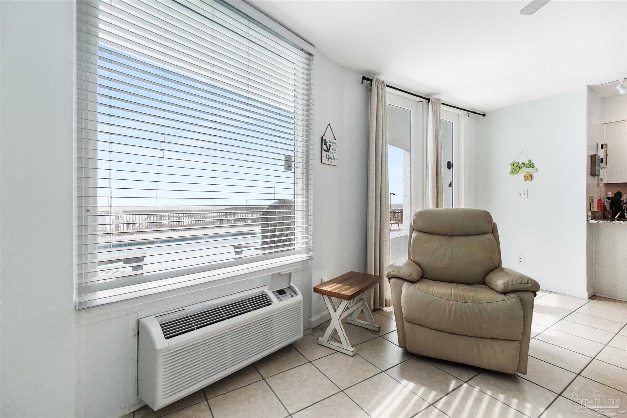 13785 Perdido Key Drive, Unit G3 Perdido Key, FL 32507 - Photo 16 of 30 a living room with furniture and a window