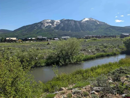 a view of a lake with mountains in the background