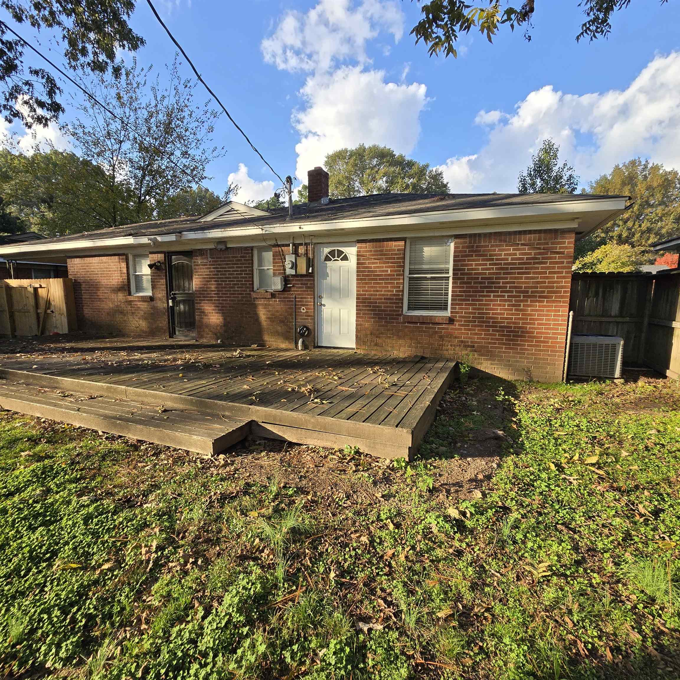 4861 Verne Road Memphis, TN 38117 - Photo 14 of 17 front view of house with a yard