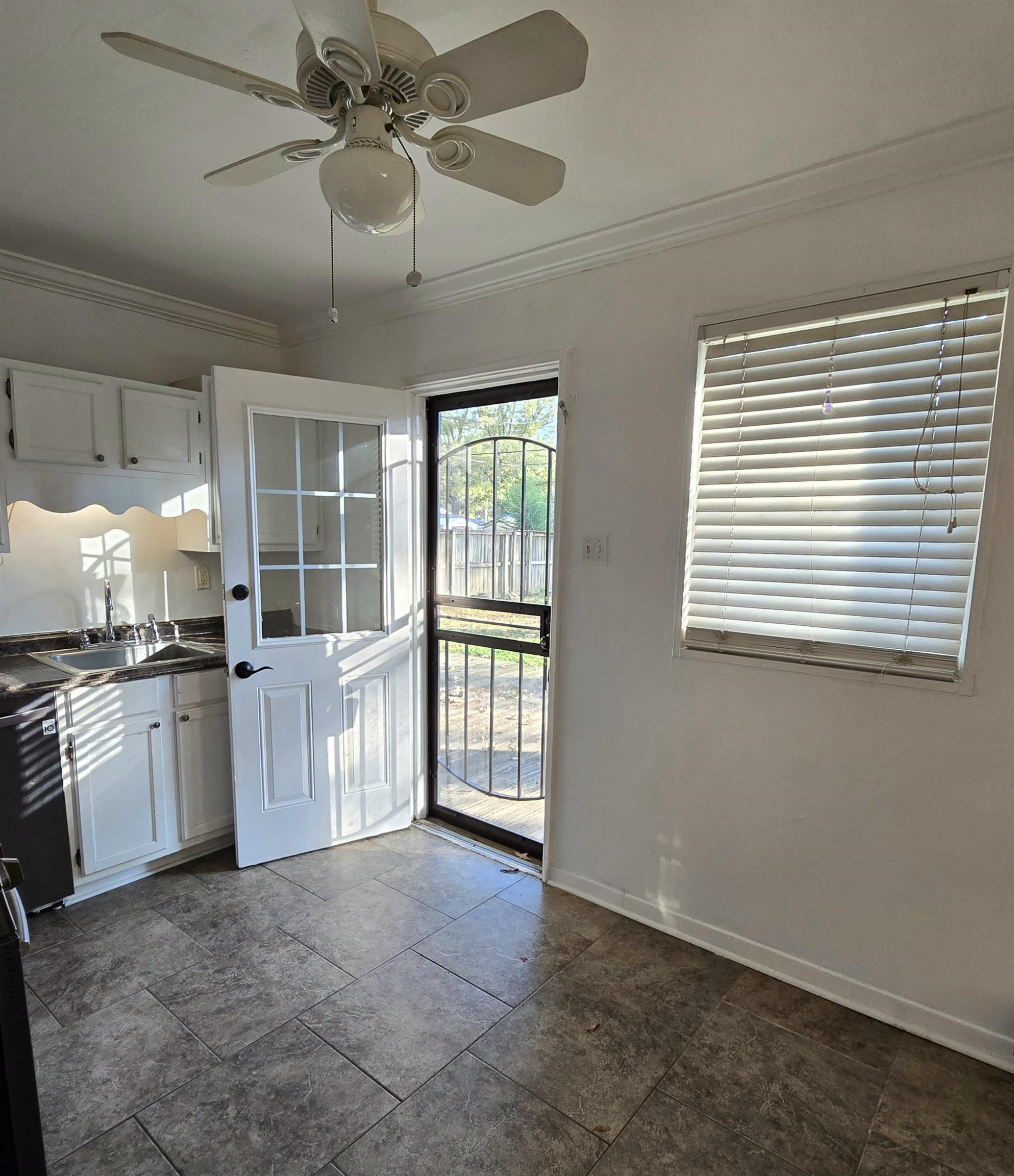4861 Verne Road Memphis, TN 38117 - Photo 5 of 17 a large kitchen with a large window appliances and cabinets