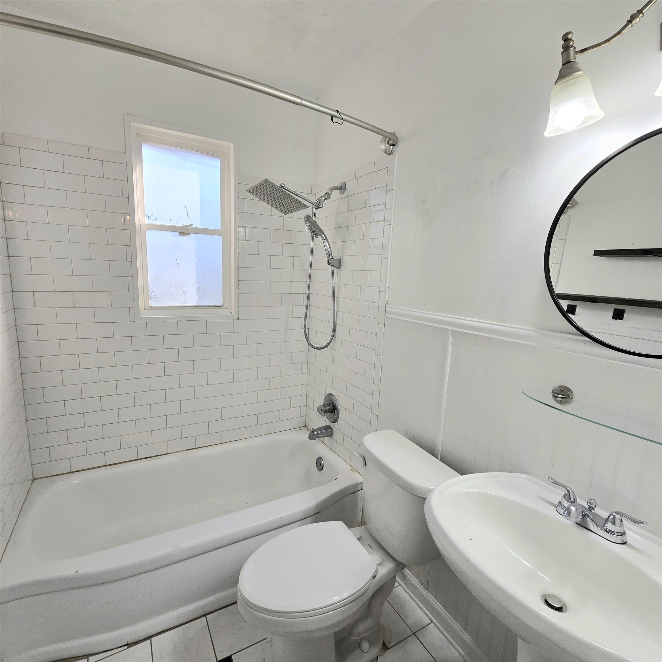 4861 Verne Road Memphis, TN 38117 - Photo 10 of 17 a bathroom with a toilet sink and shower