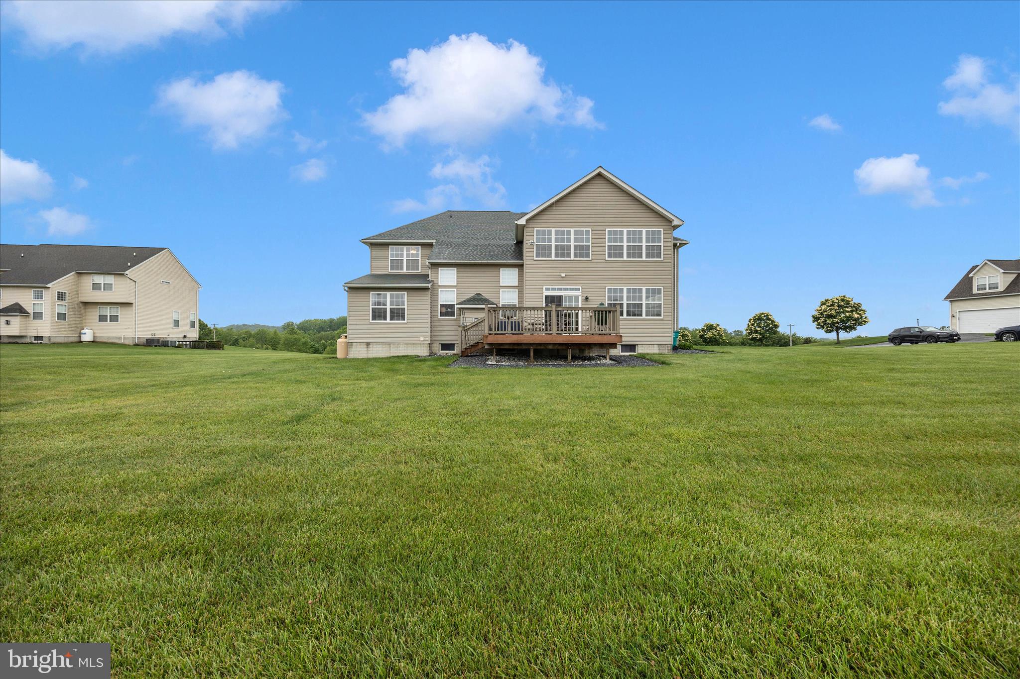 9855 McKinstry Mill Road New Windsor, MD 21776 - Photo 52 of 76 a front view of a house with garden