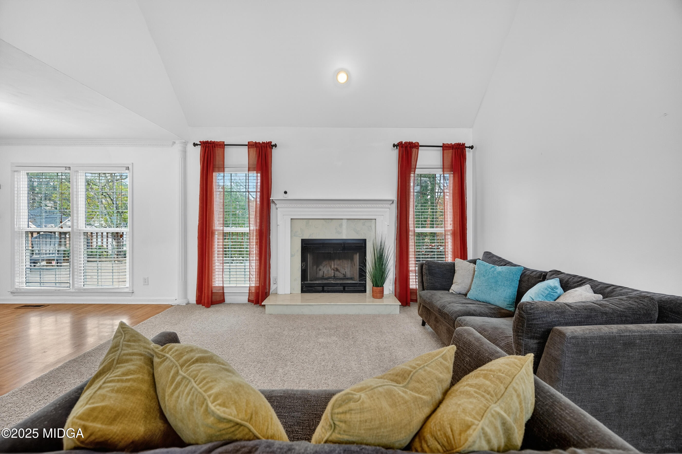 199 Springfield Boulevard Macon, GA 31210 - Photo 12 of 44 a living room with furniture and a fireplace