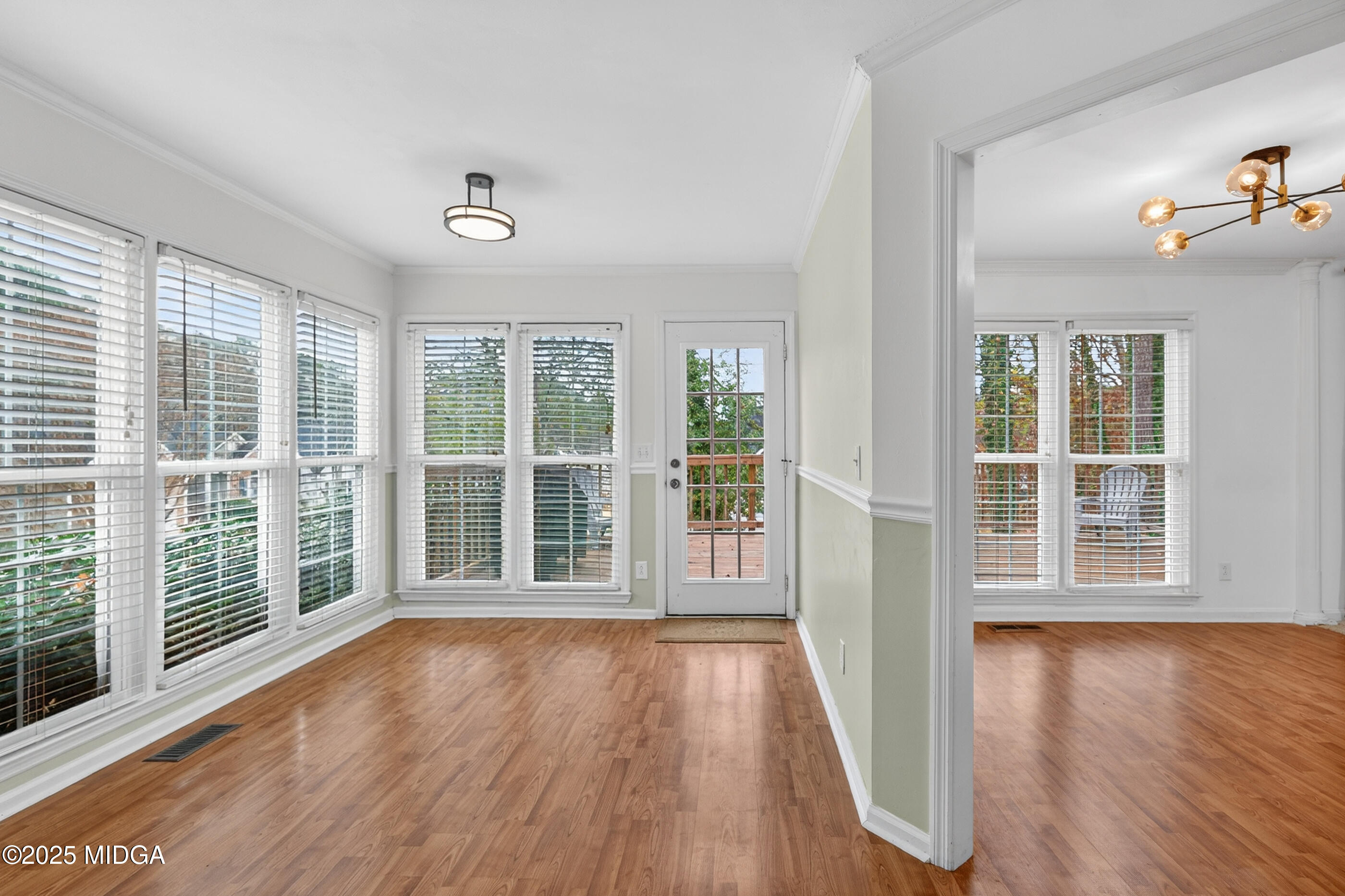 199 Springfield Boulevard Macon, GA 31210 - Photo 19 of 44 wooden floor in an empty room with a window