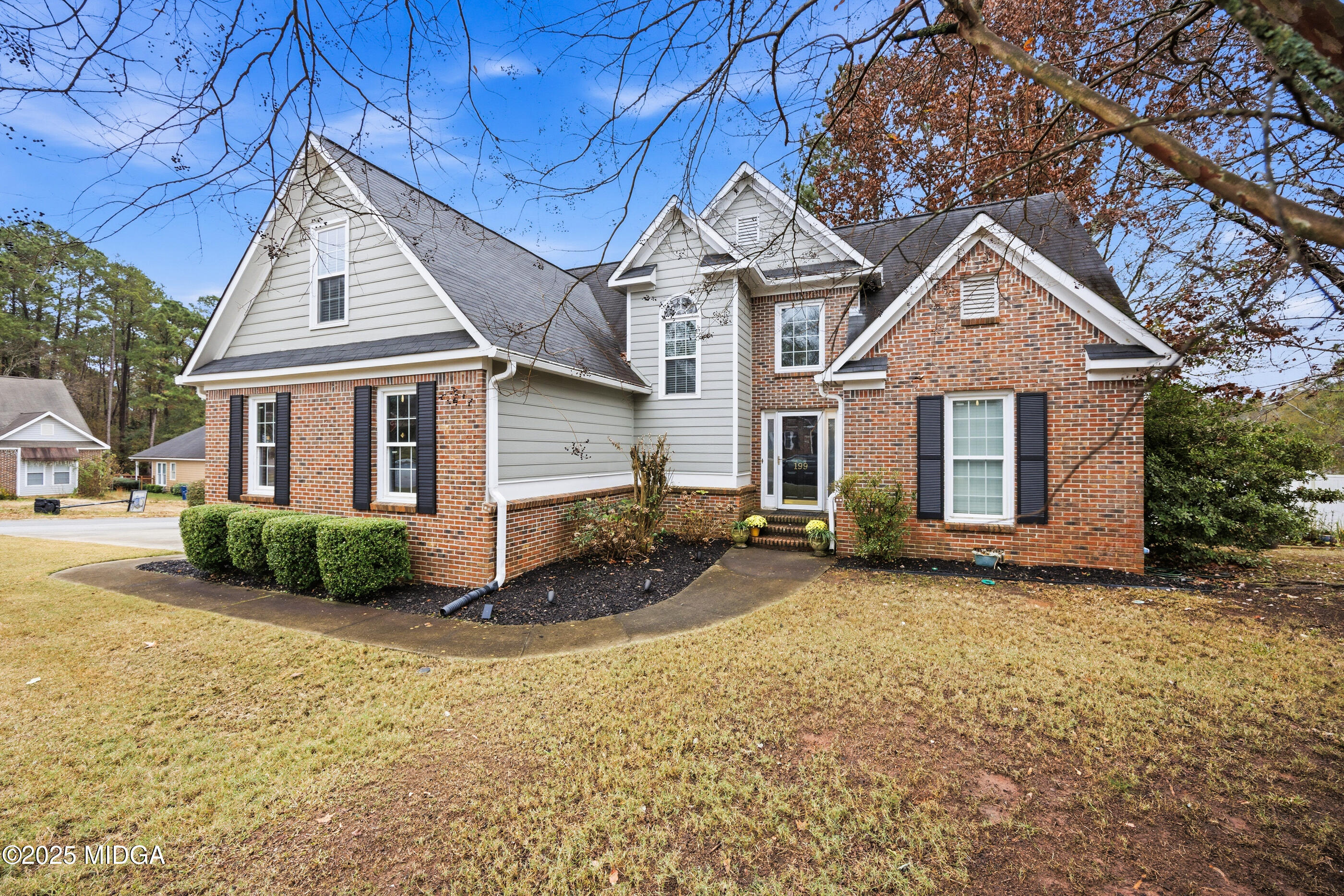 199 Springfield Boulevard Macon, GA 31210 - Photo 2 of 44 a front view of a house with a yard