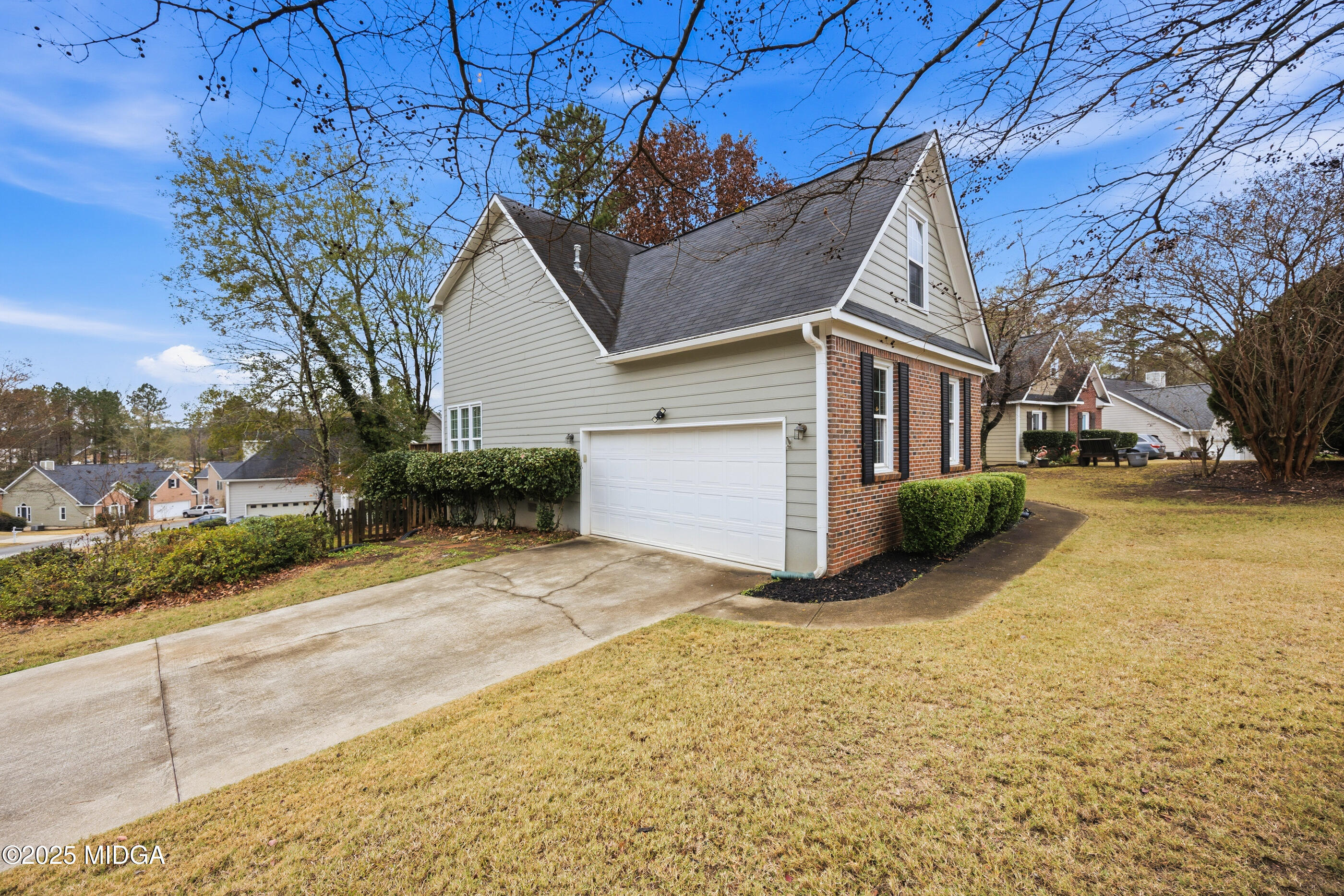 199 Springfield Boulevard Macon, GA 31210 - Photo 7 of 44 a view of a house with a yard