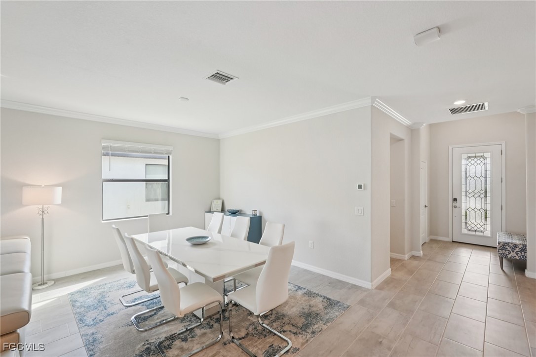 11872 Arbor Trace Drive Fort Myers, FL 33913 - Photo 11 of 50 a dining room with furniture and window