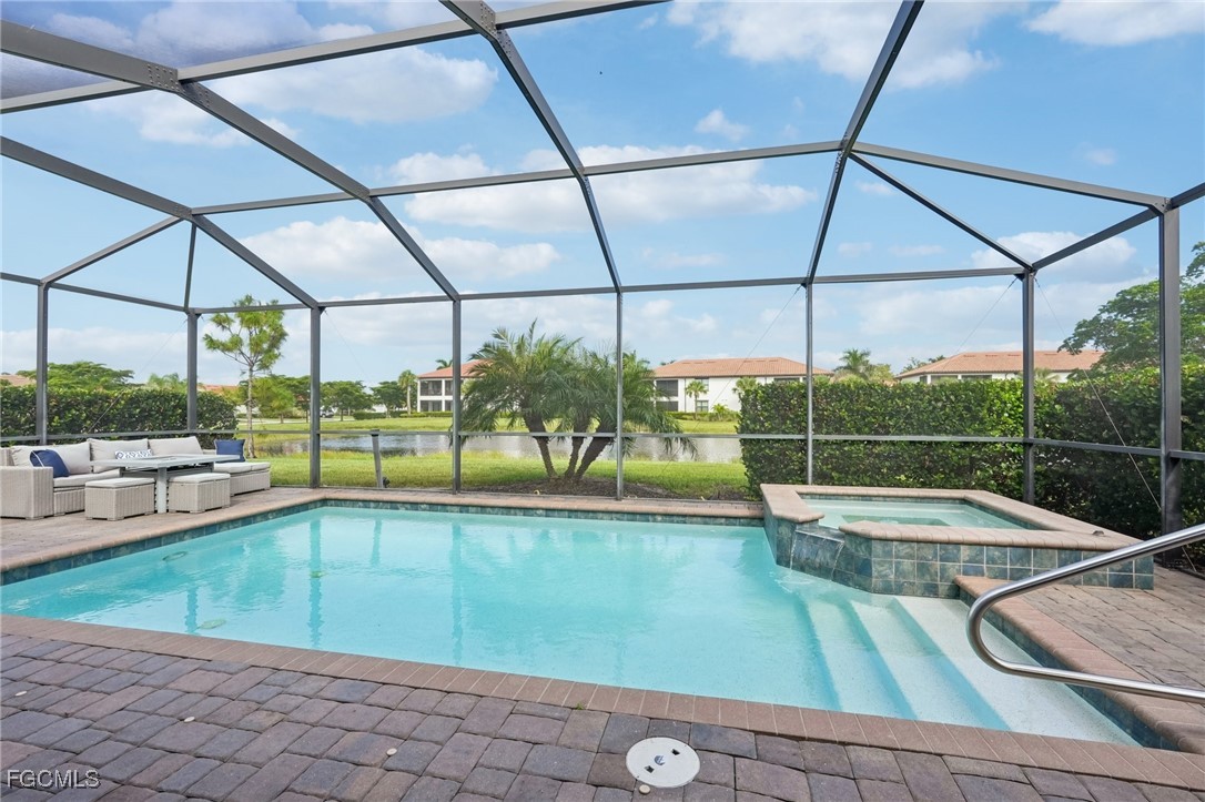 11872 Arbor Trace Drive Fort Myers, FL 33913 - Photo 24 of 50 a view of a swimming pool with a porch