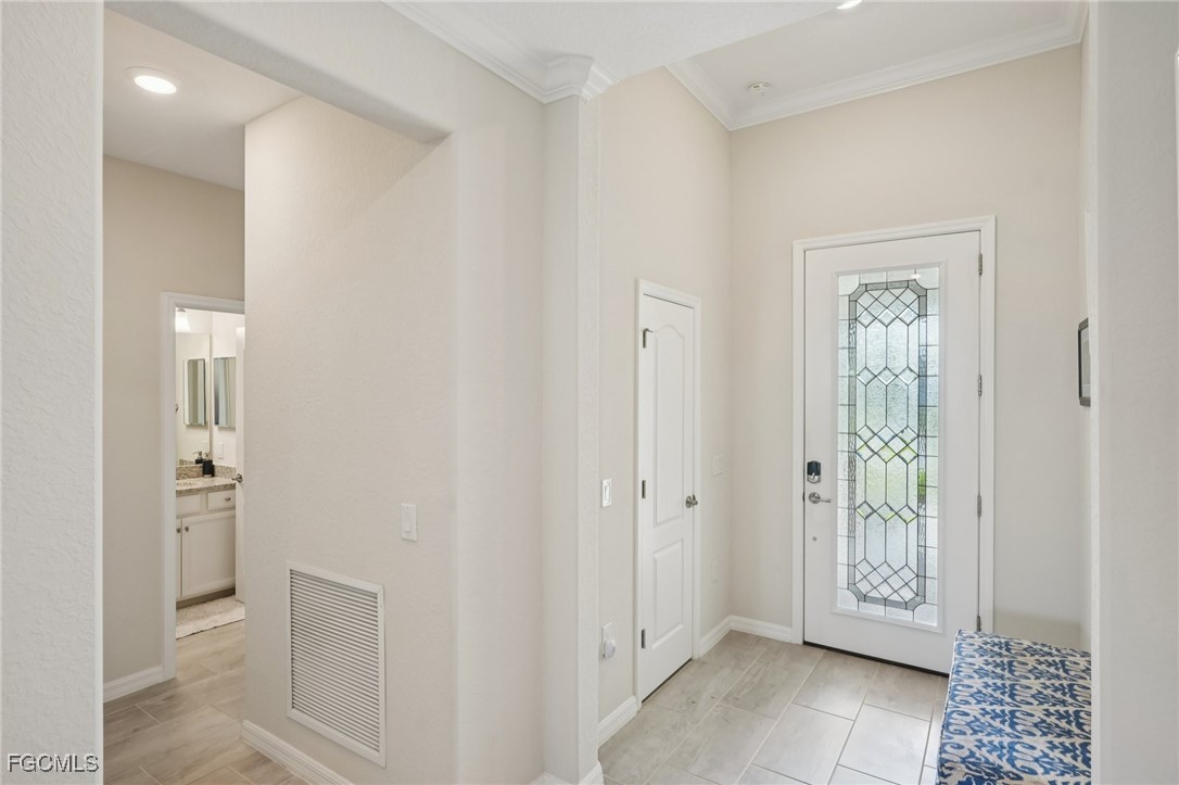 11872 Arbor Trace Drive Fort Myers, FL 33913 - Photo 4 of 50 a view of a hallway with bathroom