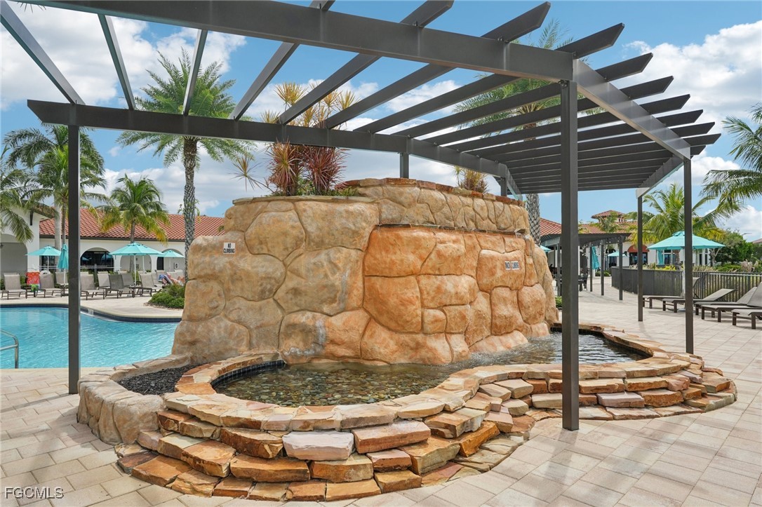 11872 Arbor Trace Drive Fort Myers, FL 33913 - Photo 44 of 50 a room with a fountain