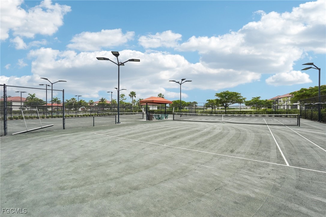 11872 Arbor Trace Drive Fort Myers, FL 33913 - Photo 48 of 50 a view of a tennis court