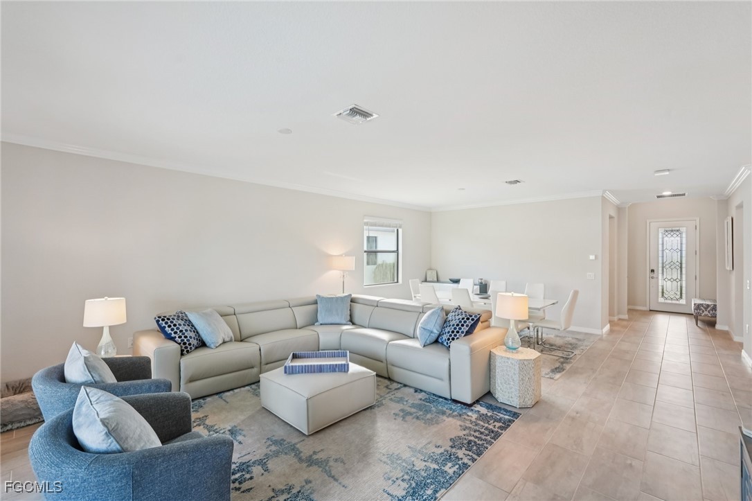 11872 Arbor Trace Drive Fort Myers, FL 33913 - Photo 5 of 50 a living room with furniture and a couch