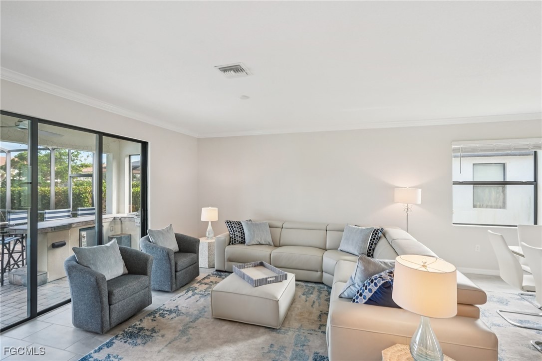 11872 Arbor Trace Drive Fort Myers, FL 33913 - Photo 7 of 50 a living room with furniture and a large window