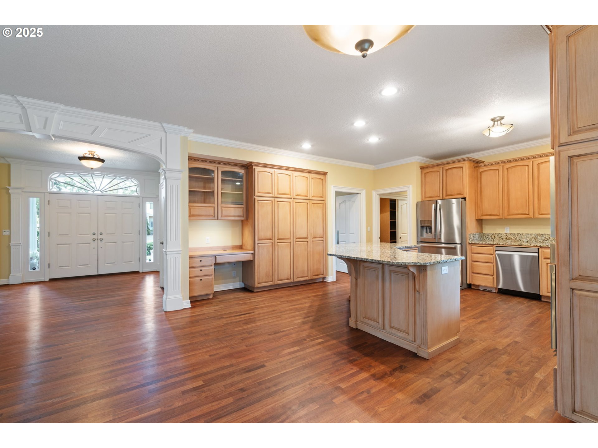 3110 Northwest Lacamas Drive Camas, WA 98607 - Photo 15 of 48 a living room with stainless steel appliances kitchen island granite countertop wooden floors and view