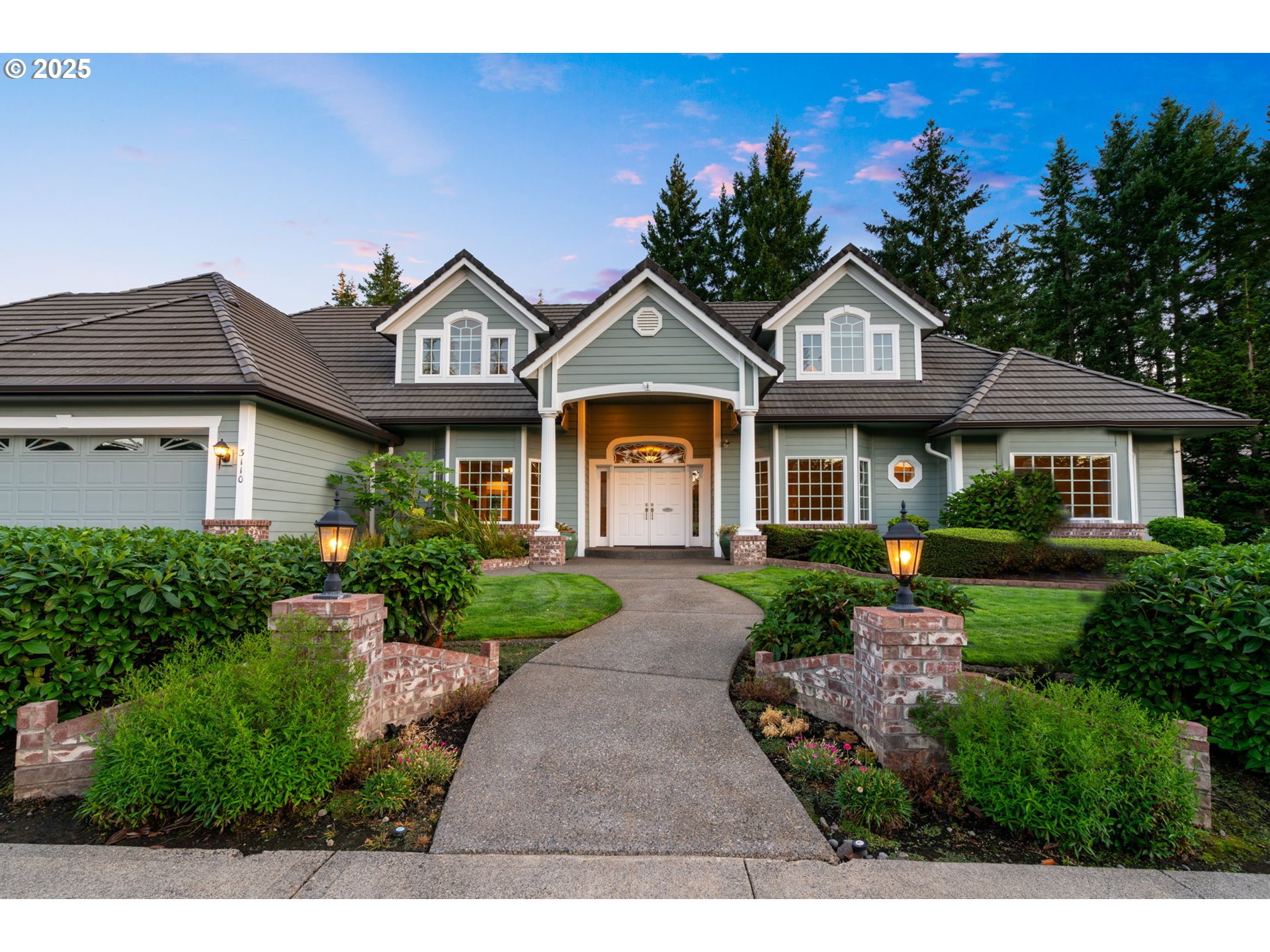 3110 Northwest Lacamas Drive Camas, WA 98607 - Photo 2 of 48 a front view of a house with a garden