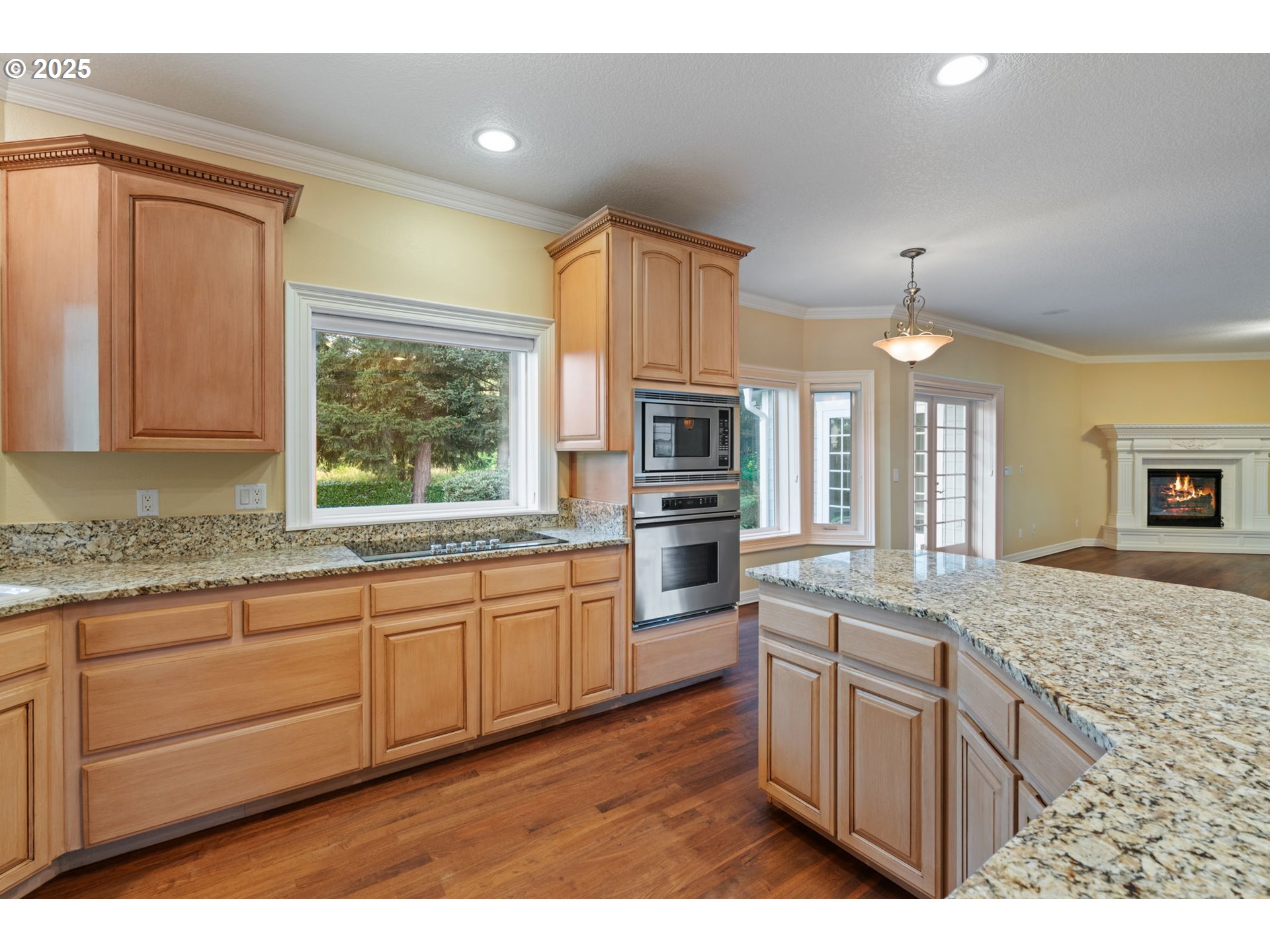 3110 Northwest Lacamas Drive Camas, WA 98607 - Photo 21 of 48 a kitchen with granite countertop a sink stainless steel appliances and cabinets