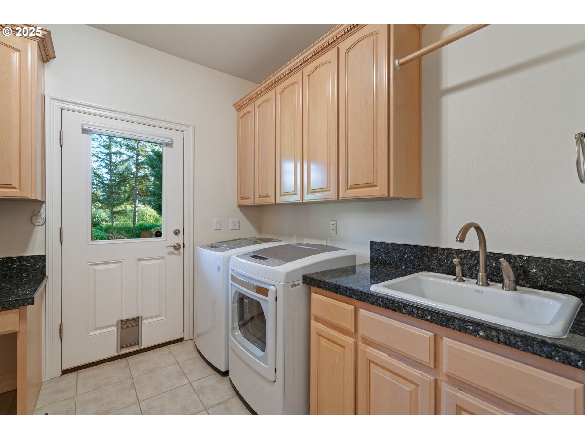 3110 Northwest Lacamas Drive Camas, WA 98607 - Photo 23 of 48 a kitchen with a sink stove and cabinets
