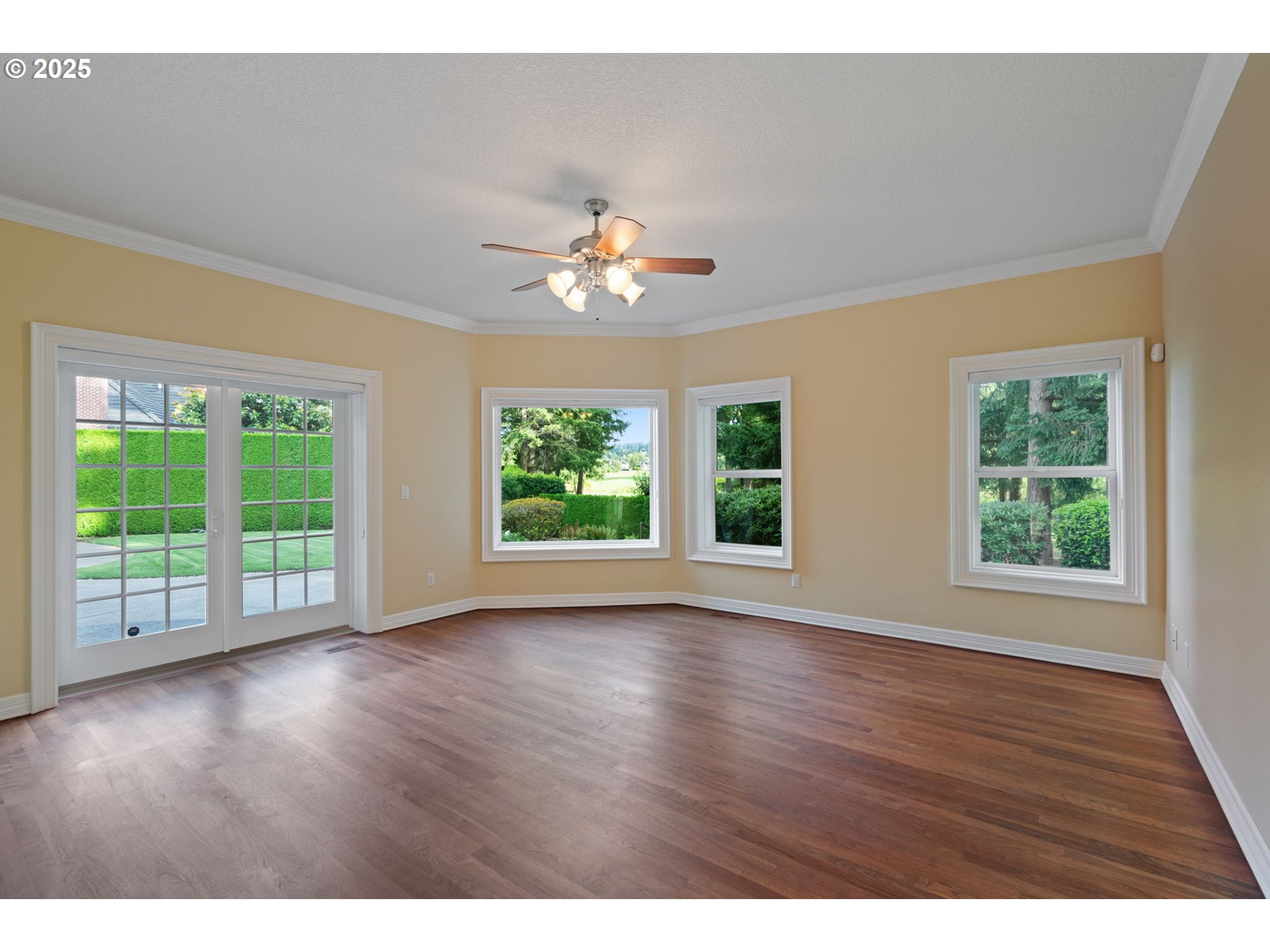 3110 Northwest Lacamas Drive Camas, WA 98607 - Photo 24 of 48 an empty room with wooden floor and windows