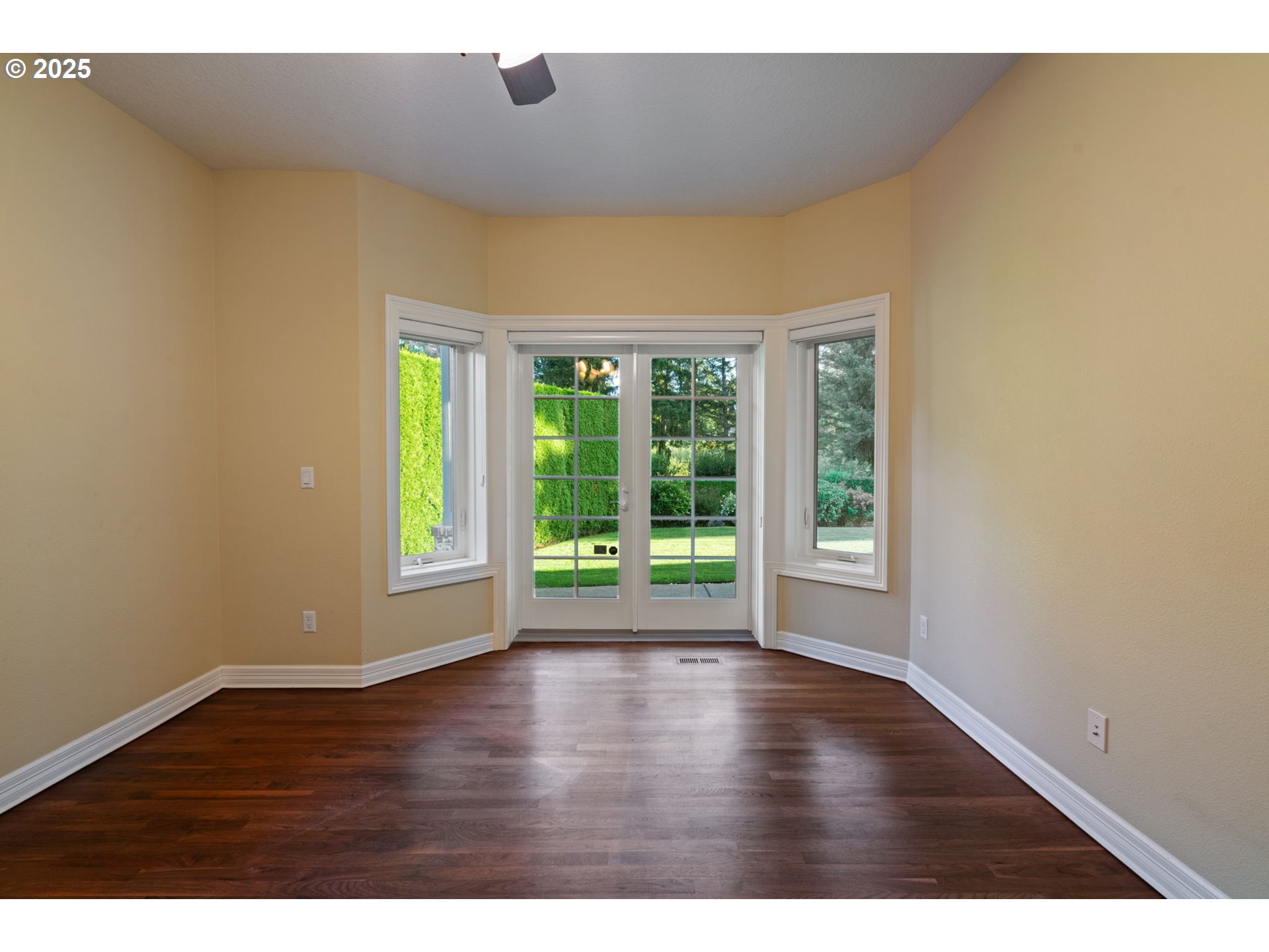 3110 Northwest Lacamas Drive Camas, WA 98607 - Photo 28 of 48 a view of an empty room with wooden floor and a window