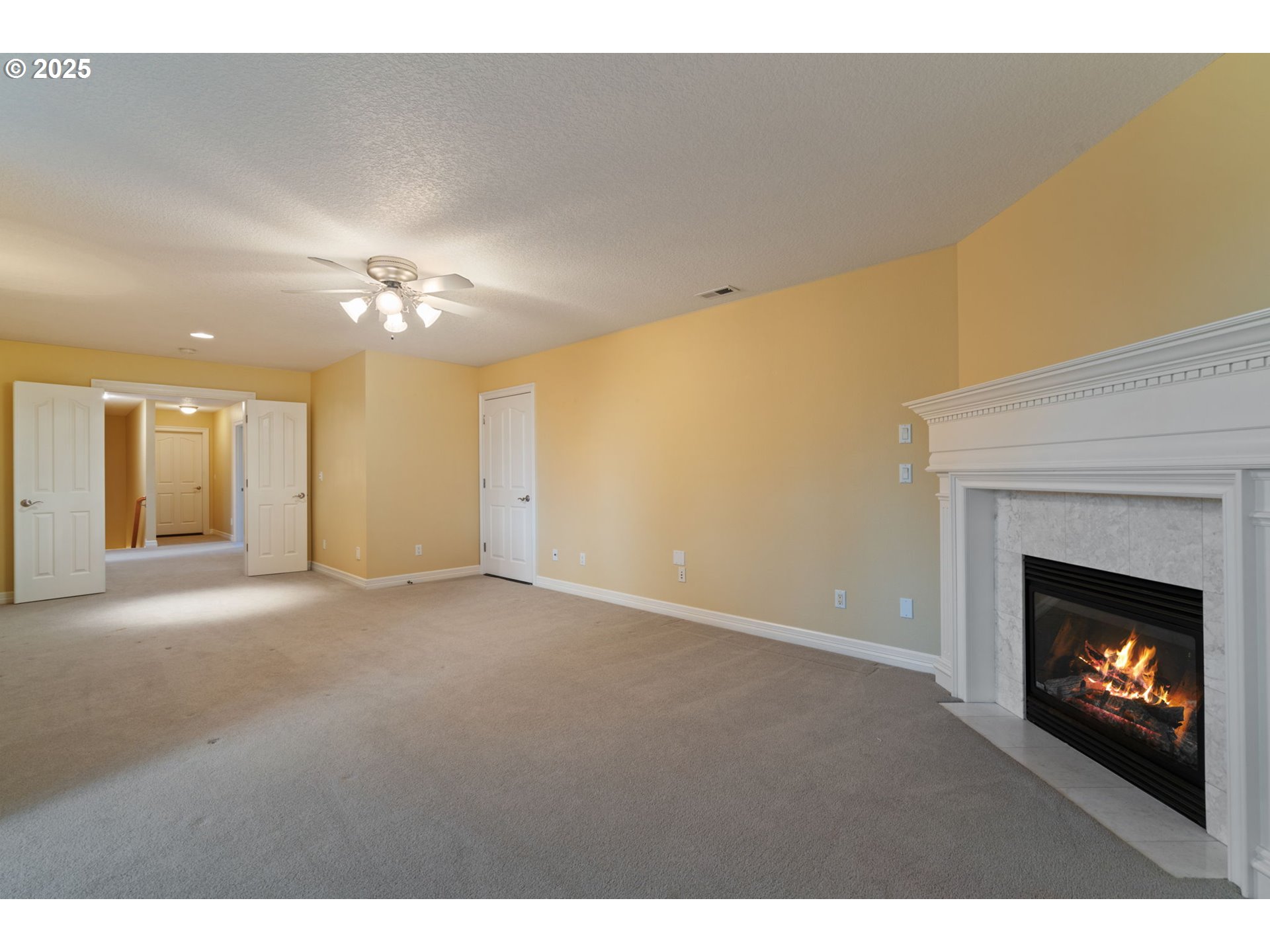 3110 Northwest Lacamas Drive Camas, WA 98607 - Photo 33 of 48 a view of an empty room with a fireplace