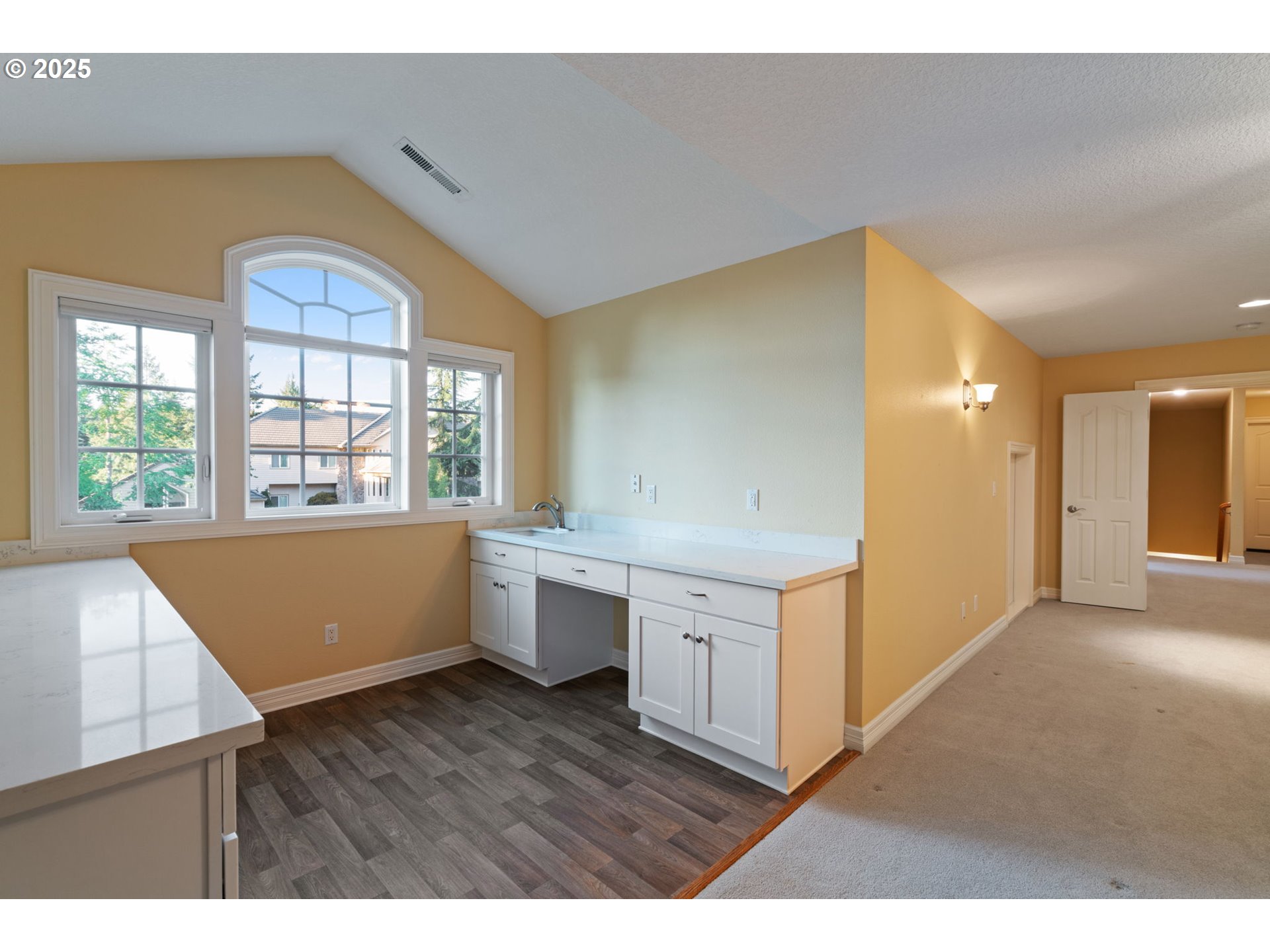 3110 Northwest Lacamas Drive Camas, WA 98607 - Photo 34 of 48 a view of kitchen with wooden floor and electronic appliances