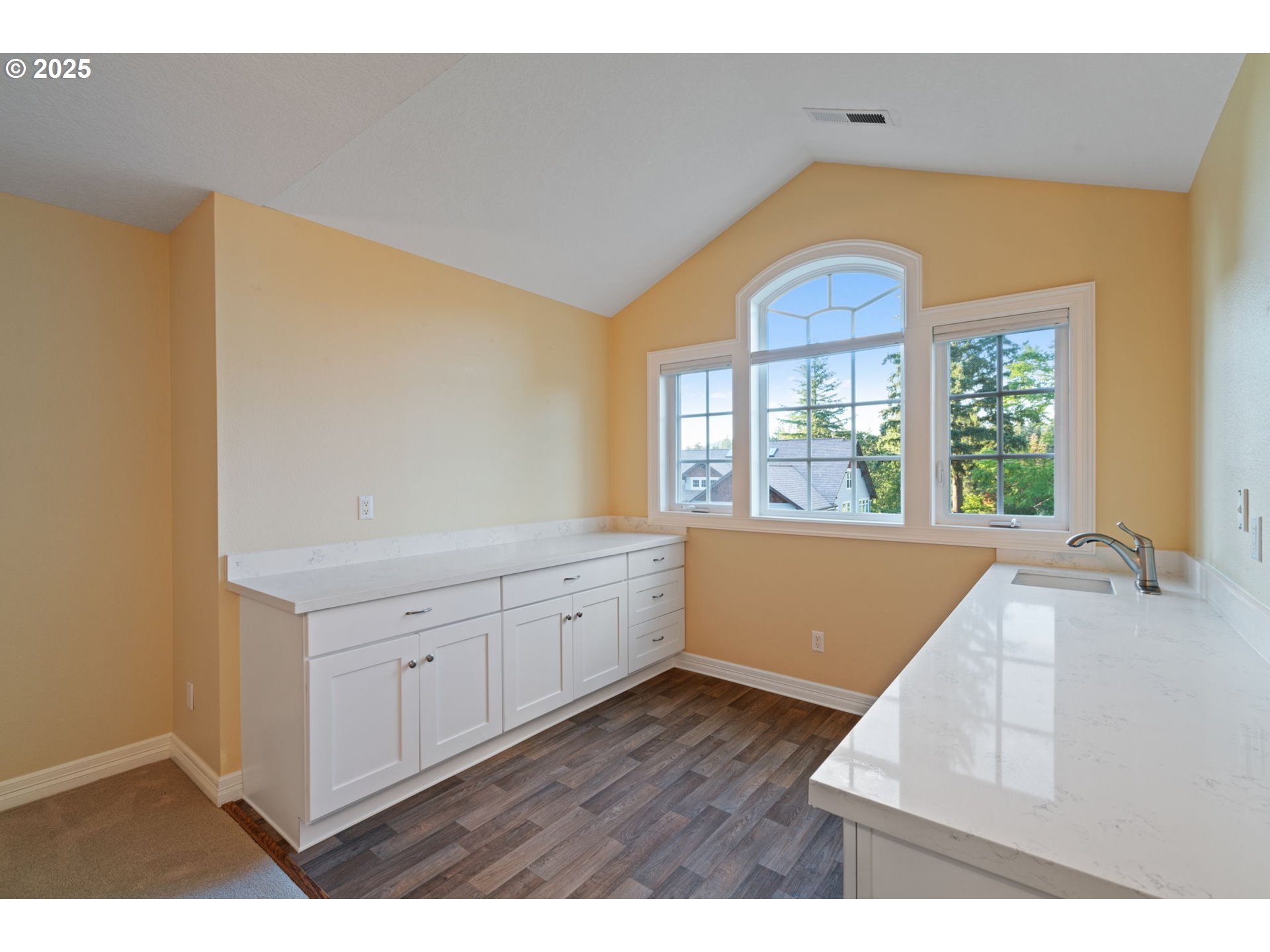 3110 Northwest Lacamas Drive Camas, WA 98607 - Photo 35 of 48 a large room with a wooden floor and windows