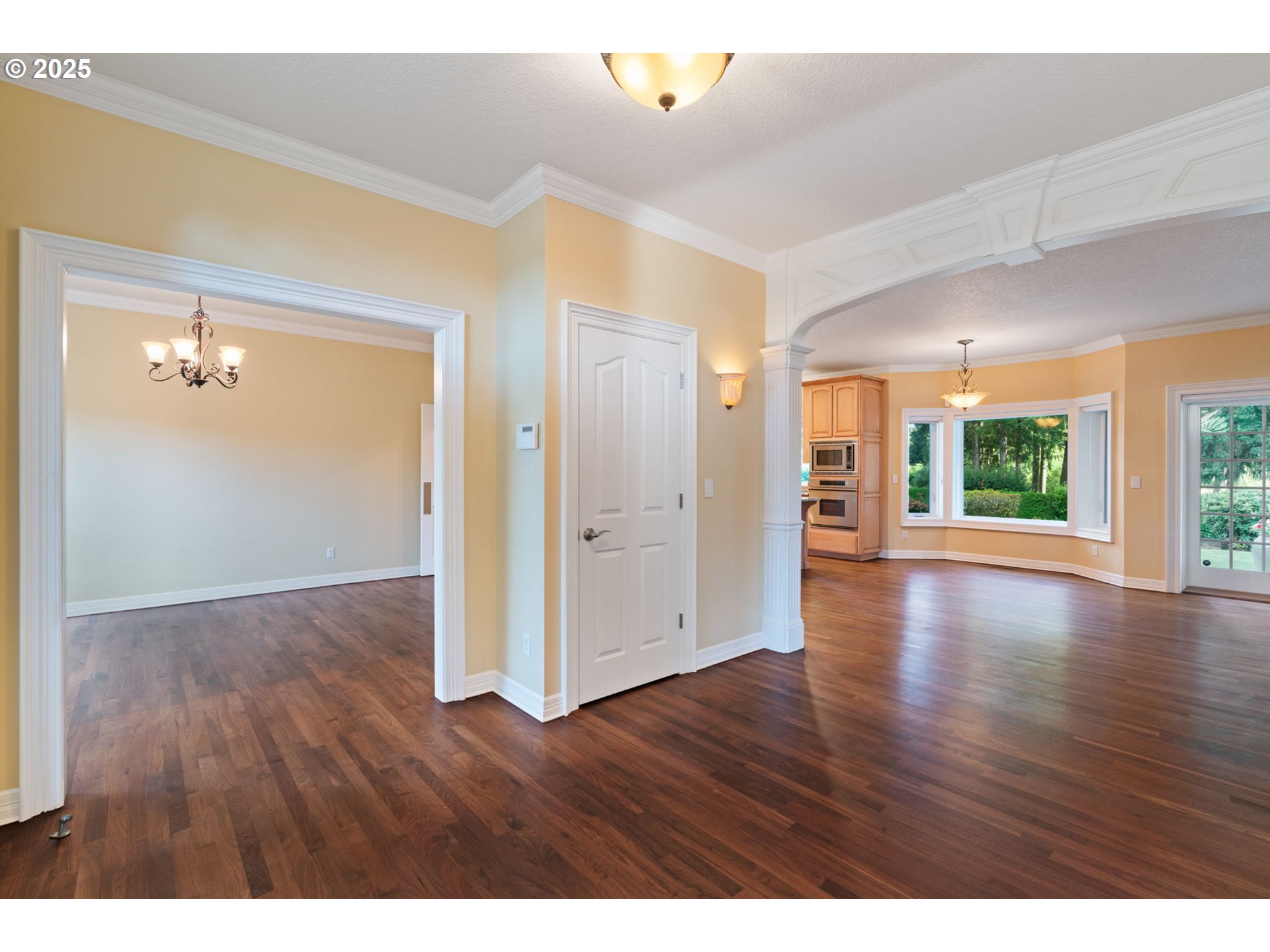 3110 Northwest Lacamas Drive Camas, WA 98607 - Photo 7 of 48 a view of an empty room with wooden floor and a window